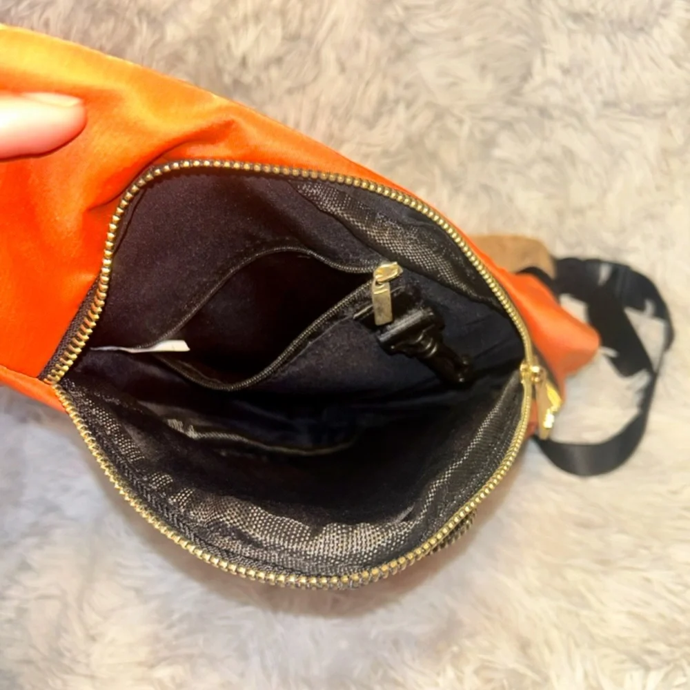 Orange body cross bag with a gold zippers. NEVER WORN - Picture 4 of 4